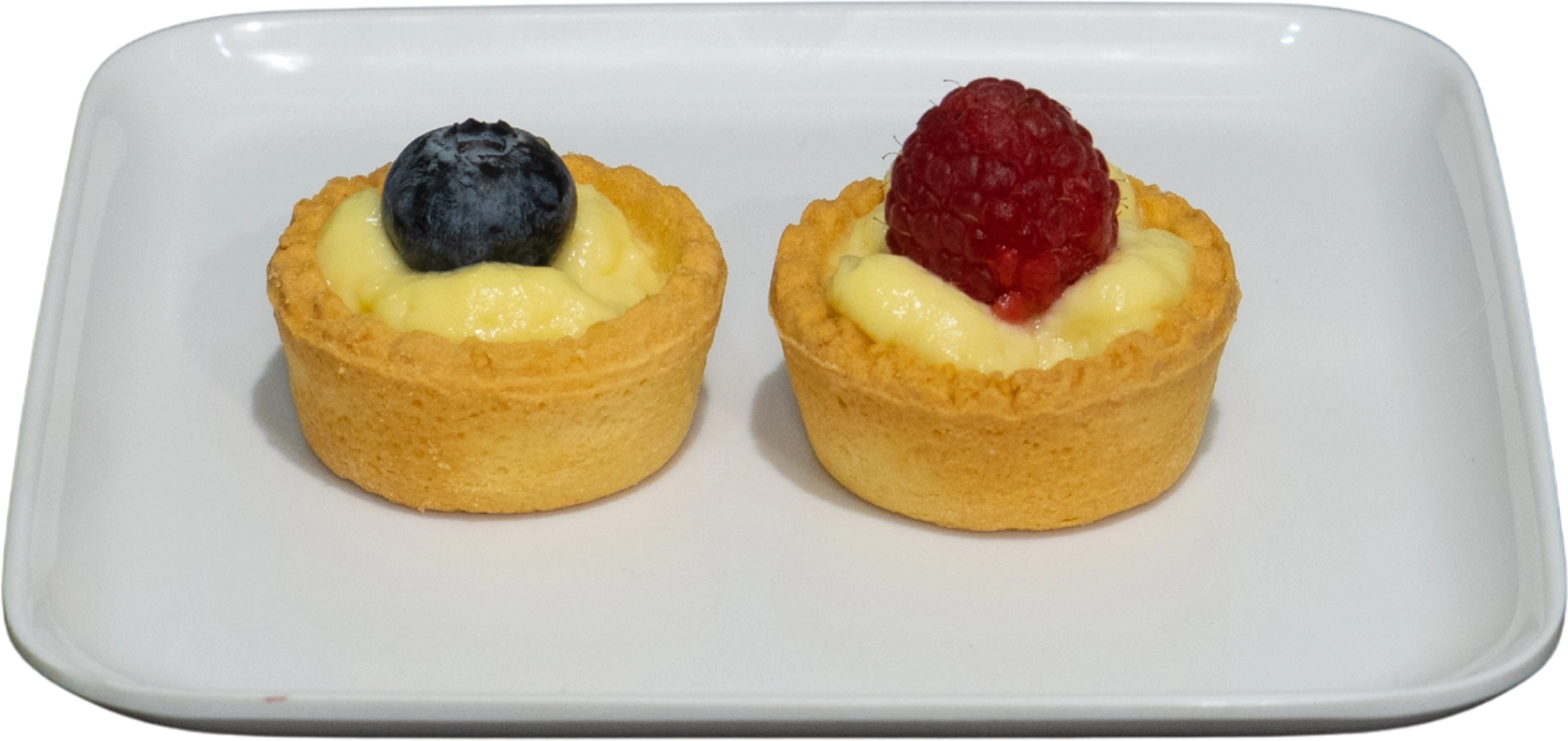 Pasticcini con crema e frutti di bosco